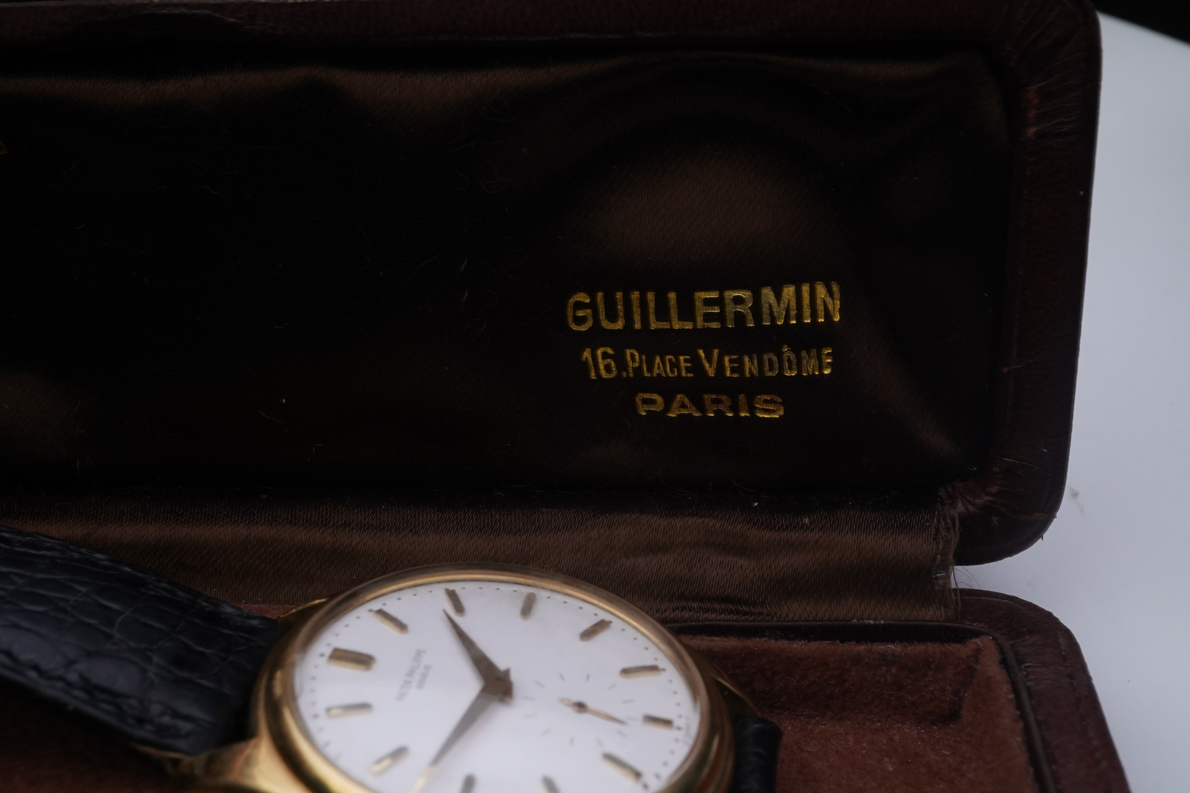 A gentleman's fine 18ct gold Patek Philippe Calatrava automatic wrist watch, model number 2526, on a Patek Philippe black leather strap with a Patek Philippe 18ct gold buckle